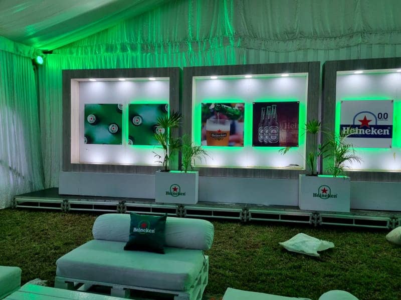 Cover of the Heineken Lounge album: a green-lit Heineken lounge with backlit product-display walls and pallet seating