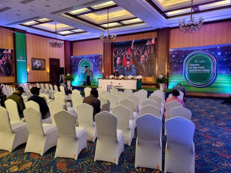 Cover of the Heineken UEFA Champions League Trophy Tour album: a branded ballroom with LED football screens